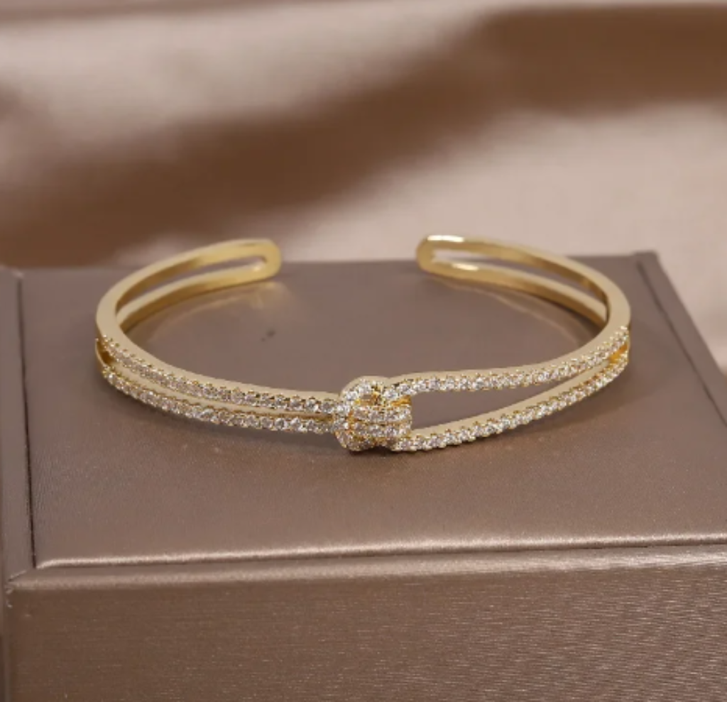Exquisite AAA Luxury Full Zircon Knot Bracelet - a true symbol of elegance and sophistication. Designed specifically for women