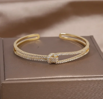 Exquisite AAA Luxury Full Zircon Knot Bracelet - a true symbol of elegance and sophistication. Designed specifically for women